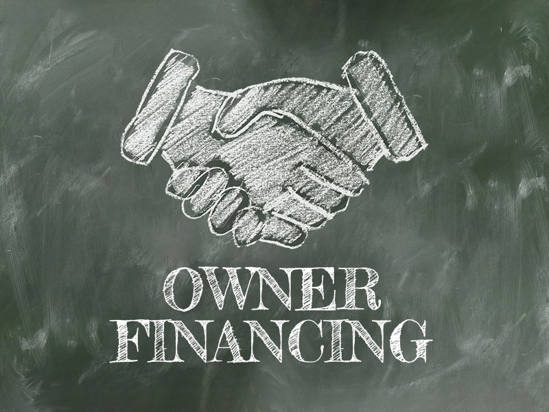 Owner Financing written on Chalkboard